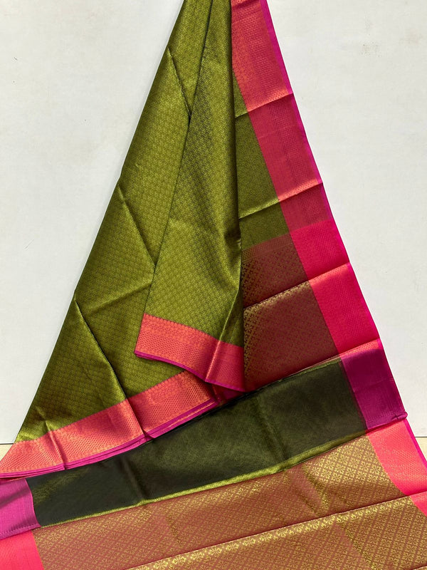 Enigmatic Forest Green Kora Maslin Saree with Pink Border