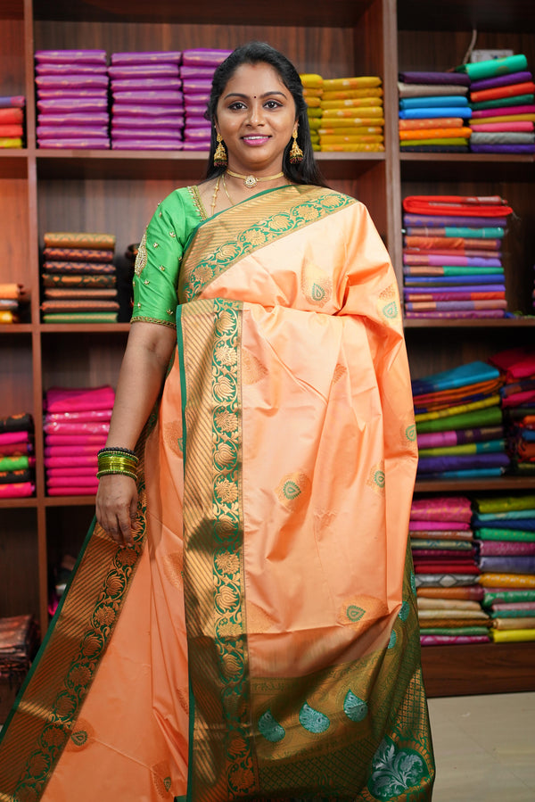 Orange Bridal Meenakkari Silk Saree with Green Floral Zari Border