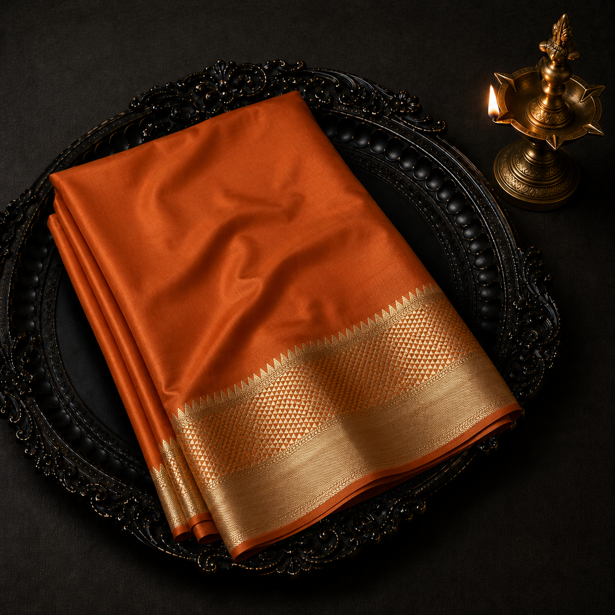 Premium Georgette Saree – Rust Orange with Rich Gold Zari Geometric Border