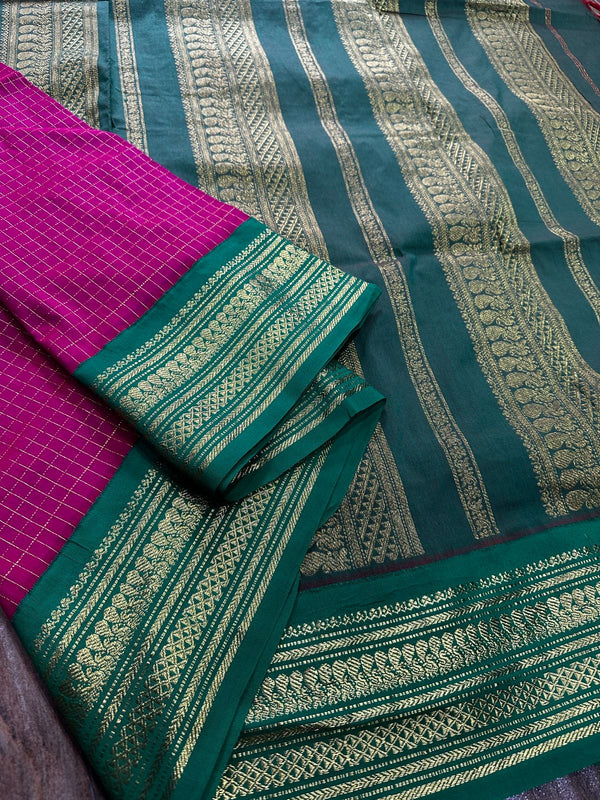 Kalyani checks with dark colours tiny peacock design in lovely border
