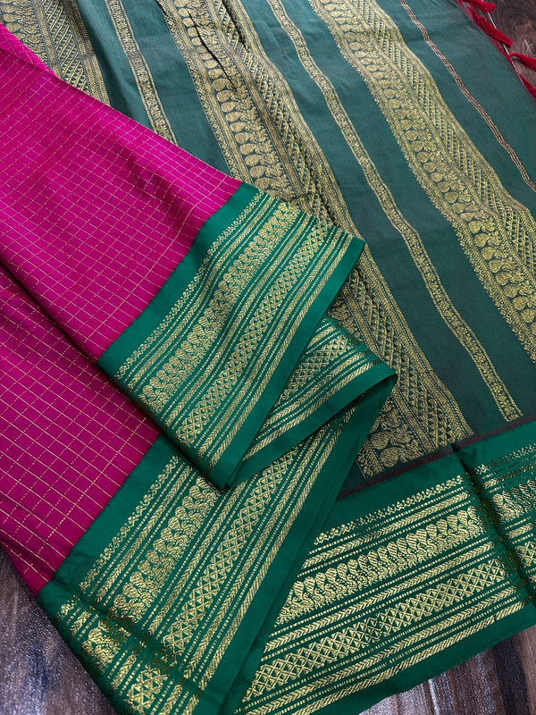 Kalyani checks with dark colours tiny peacock design in lovely border