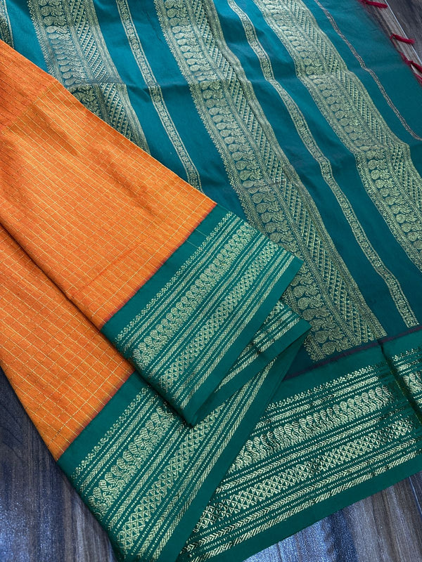 Kalyani checks with dark colours tiny peacock design in lovely border