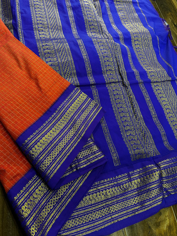 Kalyani checks with dark colours tiny peacock design in lovely border