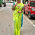 Parrot Green Semi Silk Saree with Blue Motifs