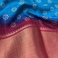 Premium Dola Silk Saree – Royal Blue with Magenta Contrast Border & Floral Woven Design