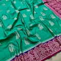 Mango Silk Saree – Emerald Green with Silver Dancing Lady Motifs & Magenta Temple Border