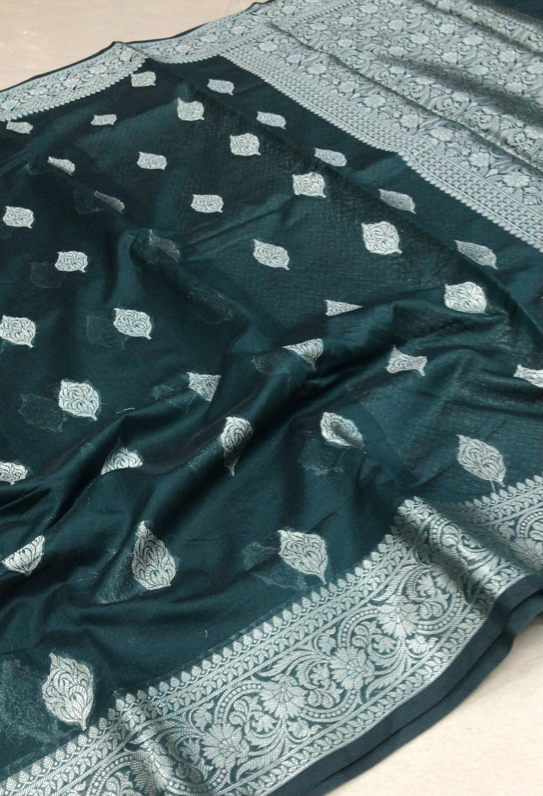 Tussar Silk Saree – Deep Bottle Green with Silver Zari Buttas & Rich Woven Border