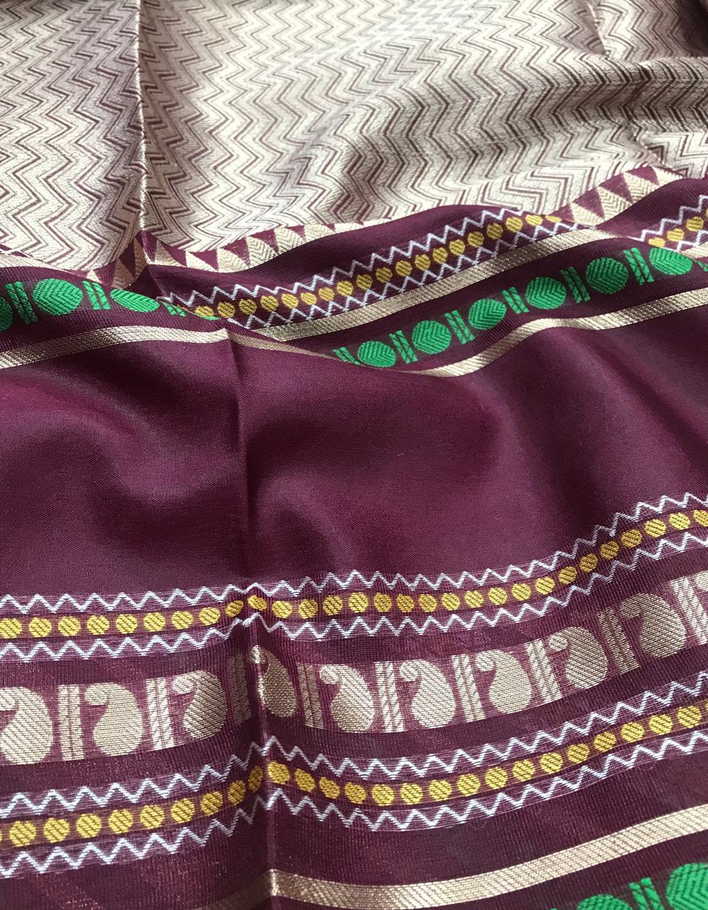 Warm Silk Saree – Wine Pink with Silver Chevron Pallu & Tribal Border